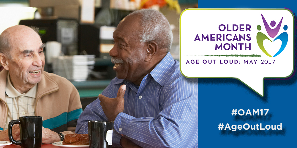image shows two older men in conversation for older americans month.