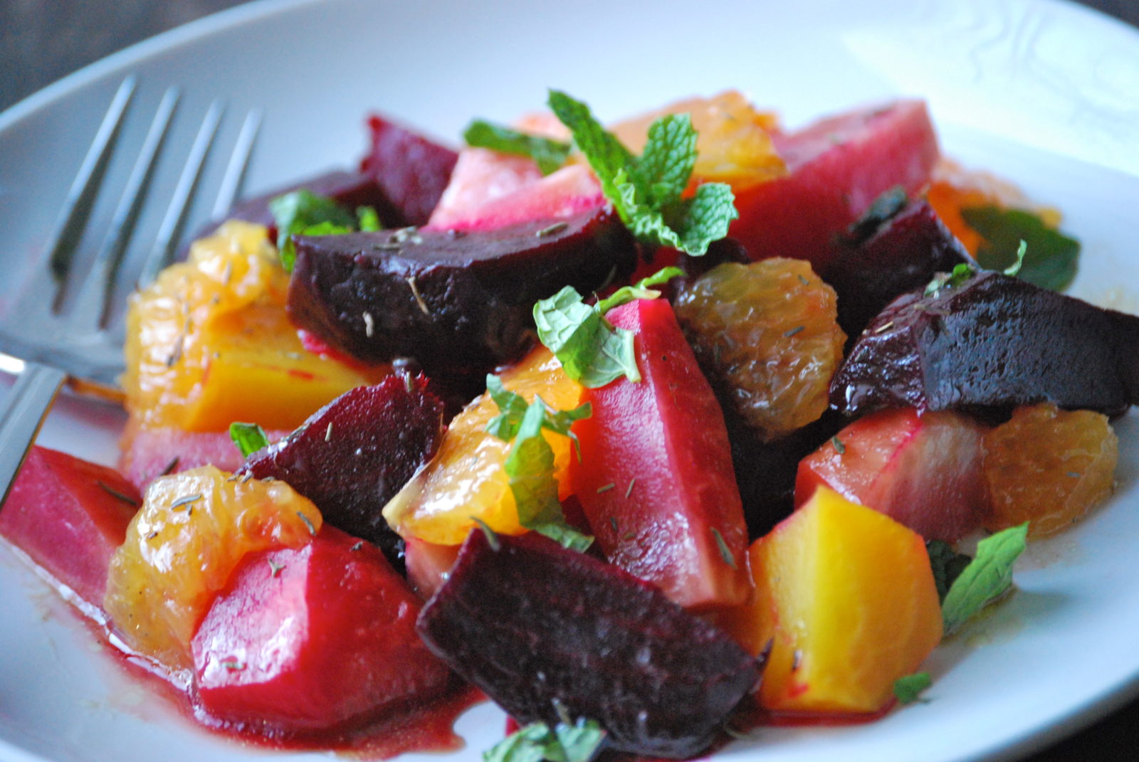 Vibrant photo of an orange beet salad