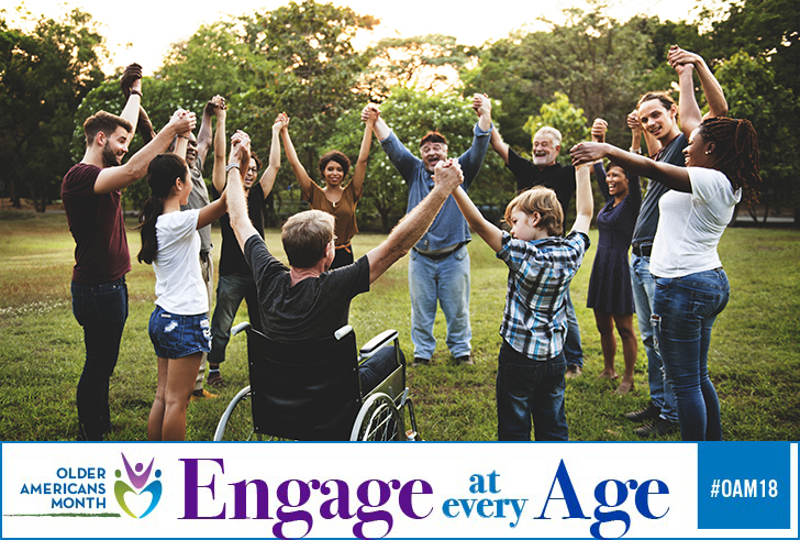 Group of people in a circle in the park, all ages, with one person who uses a wheelchair. Across the bottom, the 2018 theme for Older Americans Month reads "Engage at Every Age."