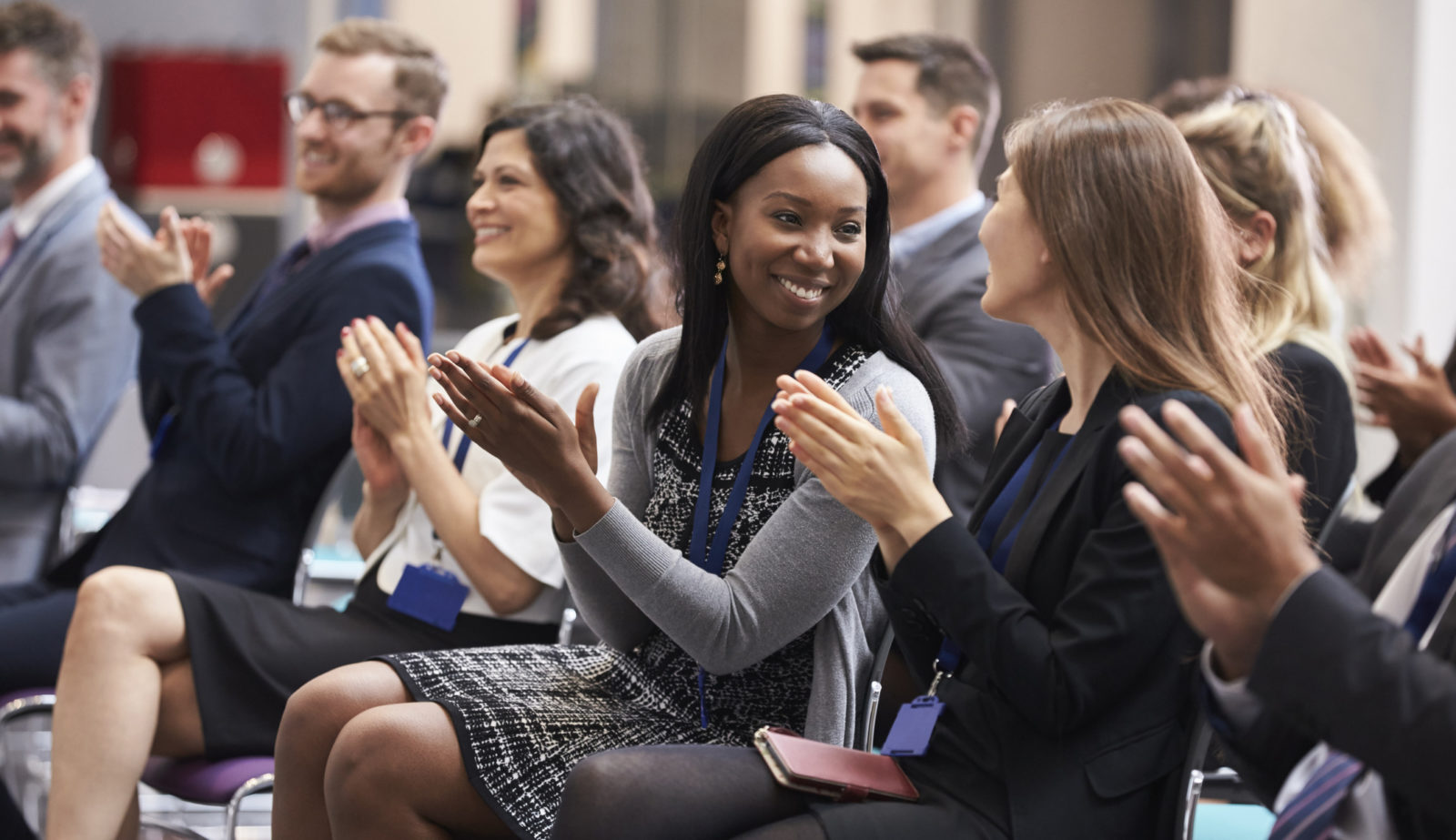 Audience Applauding Speaker After Conference Presentation