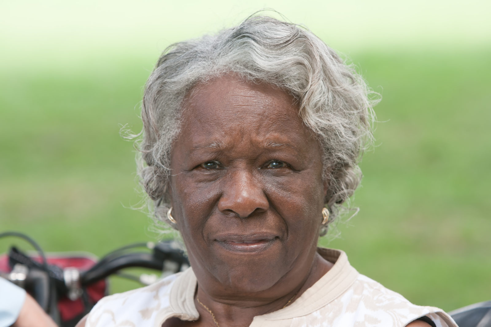 Portrait of an older african american woman outside during the day