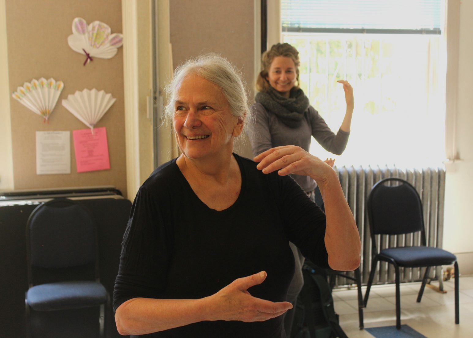 Photo by Claire Petersky shows two participants in a Tai Ji Quan: Moving for Better Balance® class at Wallingford Community Senior Center. The photo won first place in the 2018 National Council on Aging Falls Prevention Photo Contest (accessed 8/21/19 at https://bit.ly/2Zm6pME).