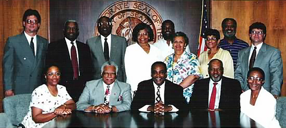 Mayor Norman B. Rice surrounded by the first members of the Mayor's Council on African American Elders, 1995