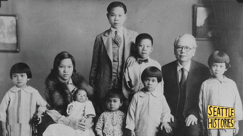 historic photo of large Asian family