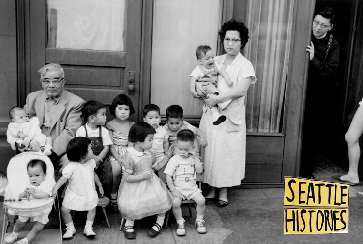 Seattle Histories photo of an Asian woman with a large number of children, toddlers and a little older