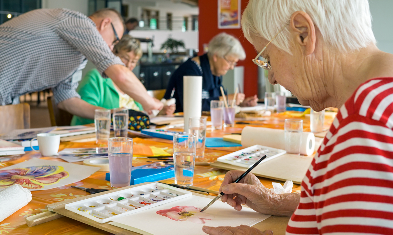 woman at watercolor painting class